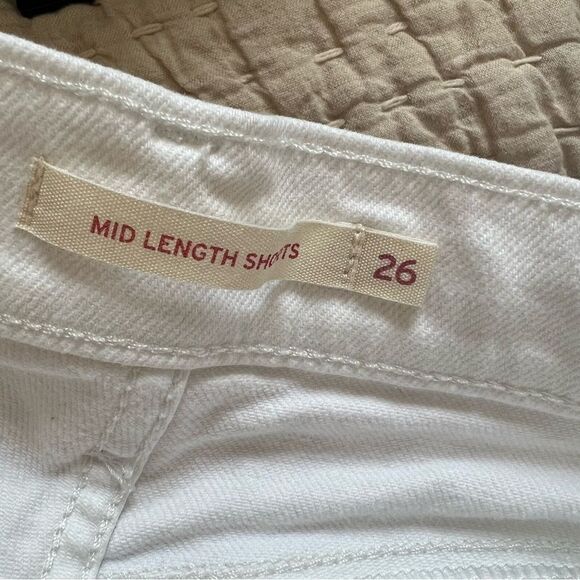 Levi’s mid length white jean shorts.  Size 26( 2) - Picture 6 of 6